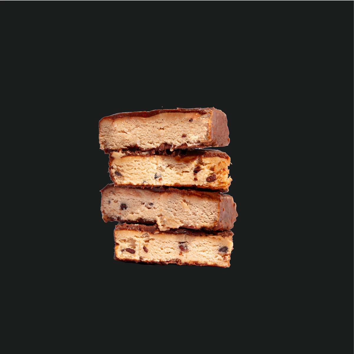 Barrita de proteína PERFORM CR sabor coco acompañada de trozos de coco